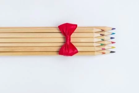 Thank your teachers with supplies. Image of colored pencils wrapped in a bow.