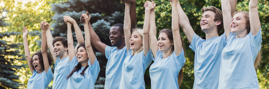 Header Image Of Team Members Cheering